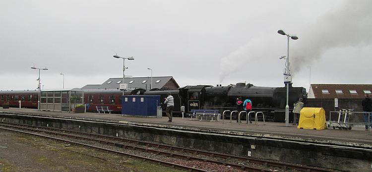 The Jacobite, a steam train, pulls out of the station at Mallaig