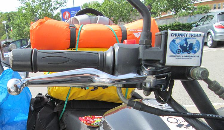 The shiny replacement lever. It's silver, fatter and wider but it works