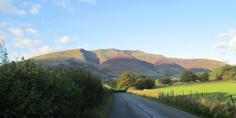 A large mountain in the lakes with curious angles and formations in its shape