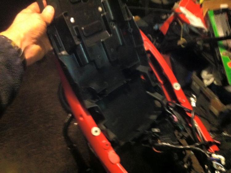 Stephen holds the undertray up as it won't go into position