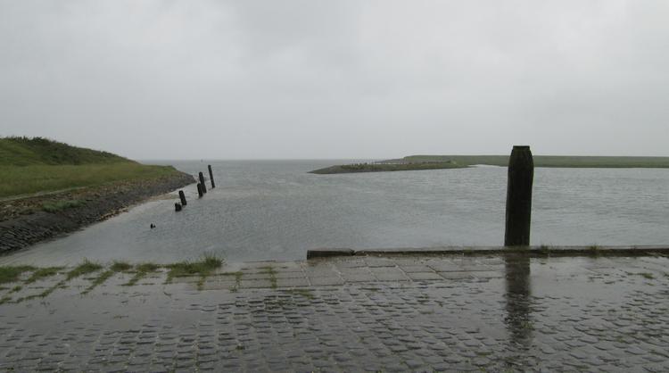 A bleak, empty and windswept bay and another dead end road