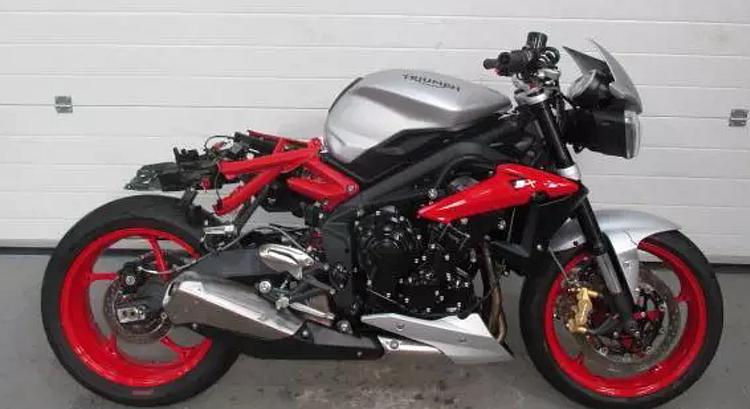 A Triumph Street Triple RX with severe damage to the rear end