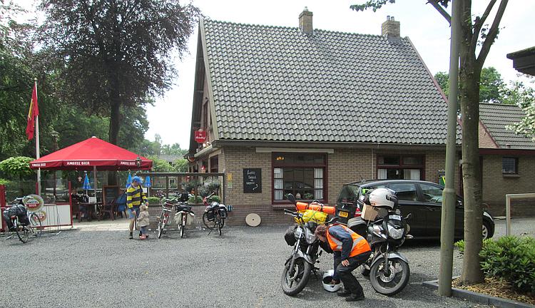 Sharon collects her helmet outside Restaurant De Brinkof in Kootwijke