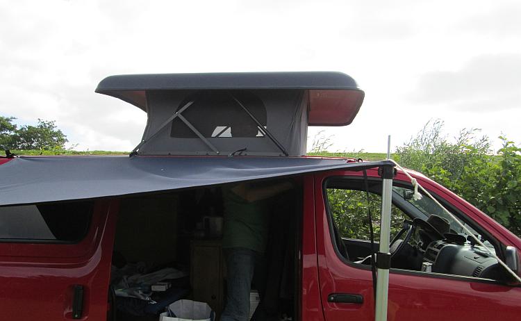 The helpful campervanner in his campervan, we can't see his face!