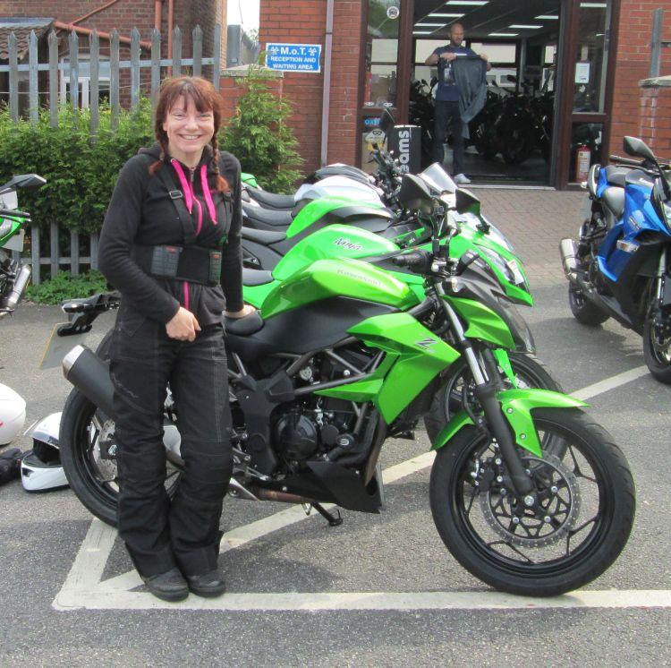 Sharon with a nervous smile when she collected the new bike