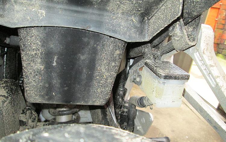 The CB500X exposes it's rear master cylinder to the muck off the rear wheel