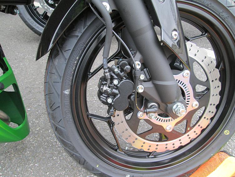 The front wheel and front brake on the Z300