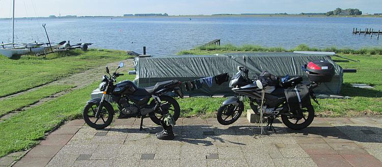 The 125s with clothes drying on a bungee between them