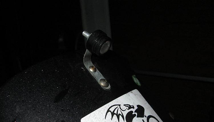 The additional front light. Just a small bright LED bolted to the fairing
