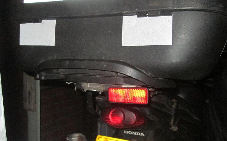 Next to the regular tail light on the CBF125 is what looks like a reflector but is actually a light