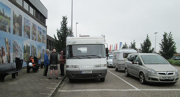 The campervan at the port as we're talking to the wonderful couple
