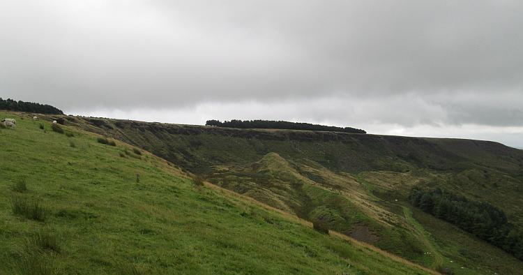 Cown or Cowan Edge. A large rounded hill, half of it has slipped into the valley