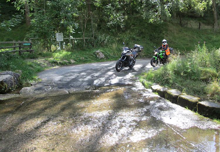 Sharon and Ren's bikes next to the small ford at Worlds End