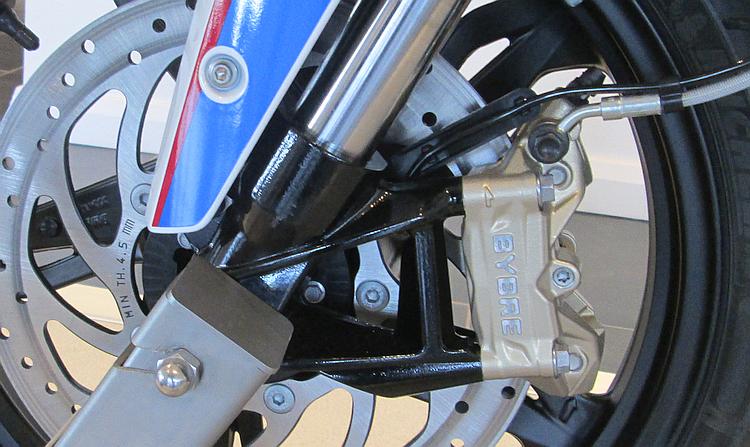 The slightly rough casting of the lower fork and brake hanger
