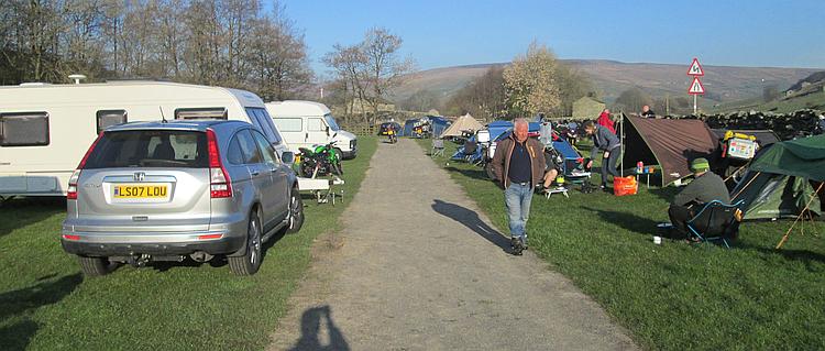 The campsite is filled with tents, caravans and Chunky Tread members in the sun