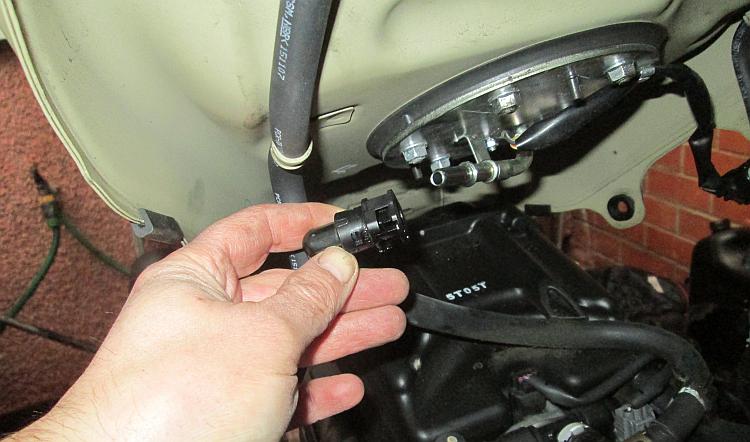 Where the pipe connects to the fuel tank