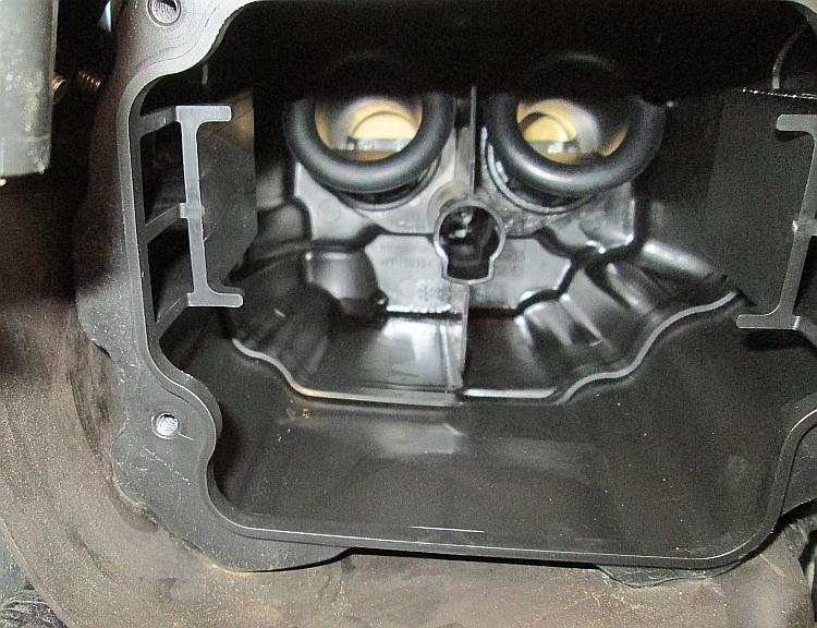 looking into the airbox we see the throttle bodies and the butterfly valves