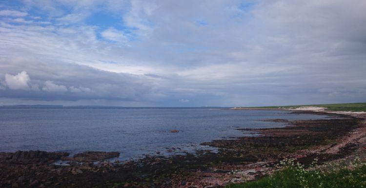 A stony and remote beach at John O'Groats
