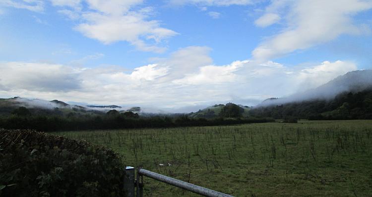 Mist settles on the hills as the sun comes out on the road from Machynlleth to Aberystwyth