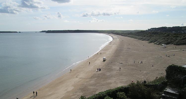 The massive long beach at Tenby covered in golden sand