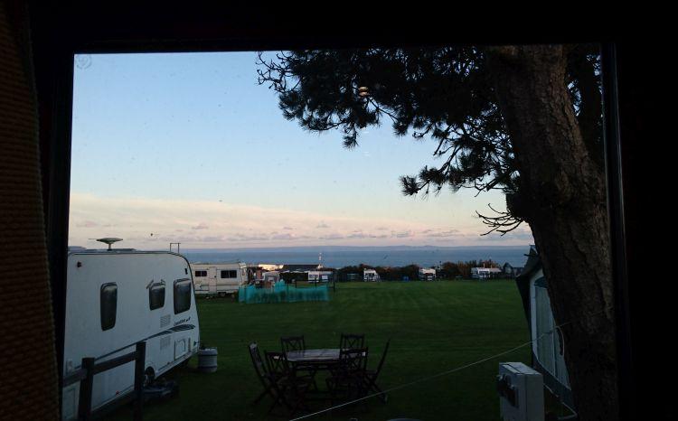Looking out from the pod window the blue skies are getting darker across the vast ocean