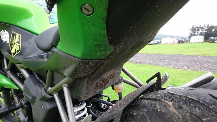 The rear of Sharon's Kawasaki is covered in mud, grass and dirt from today's wet ride