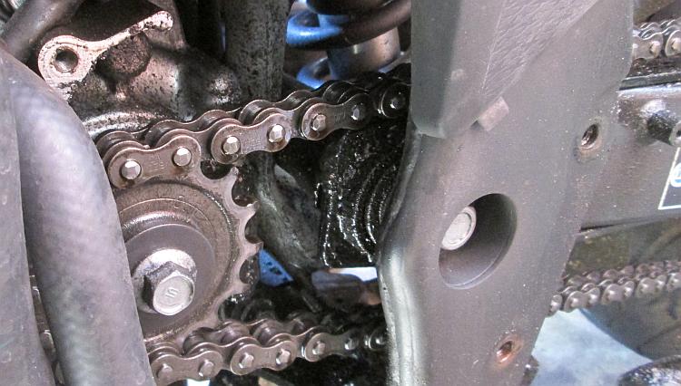 the oily and dirty chain slider next to the front sprocket