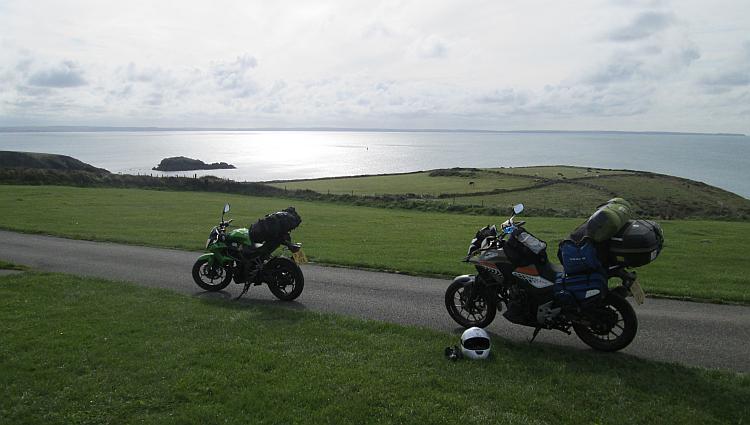 The bikes are loaded with luggage and ready to hit the road