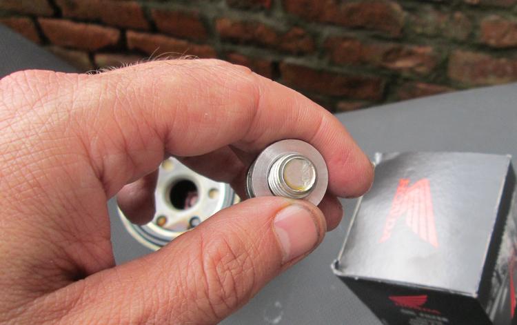 A shiny new washer for the sump nut