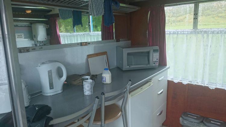 The small but perfectly functional kitchen in one of the old compartments of the carriage
