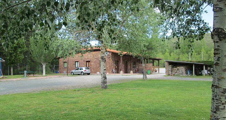A brick built building houses the reception and a bar at the campsite