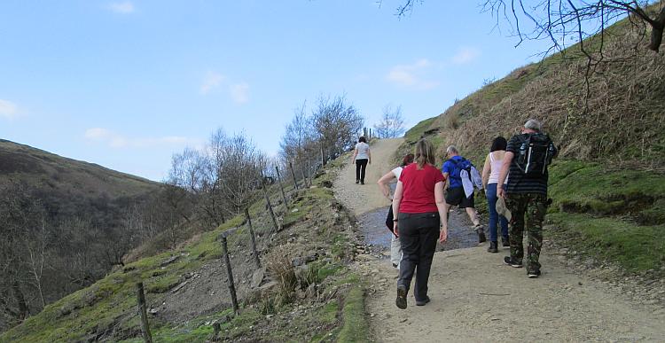 A steep gravel path leads up the side of a gorgeous valley in The Dales
