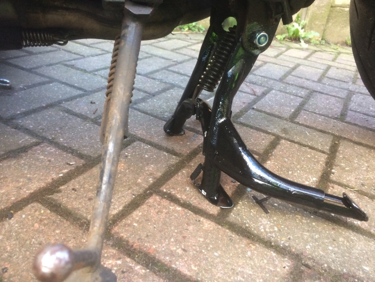 The shiny black centre stand all fitted back onto the Fazer