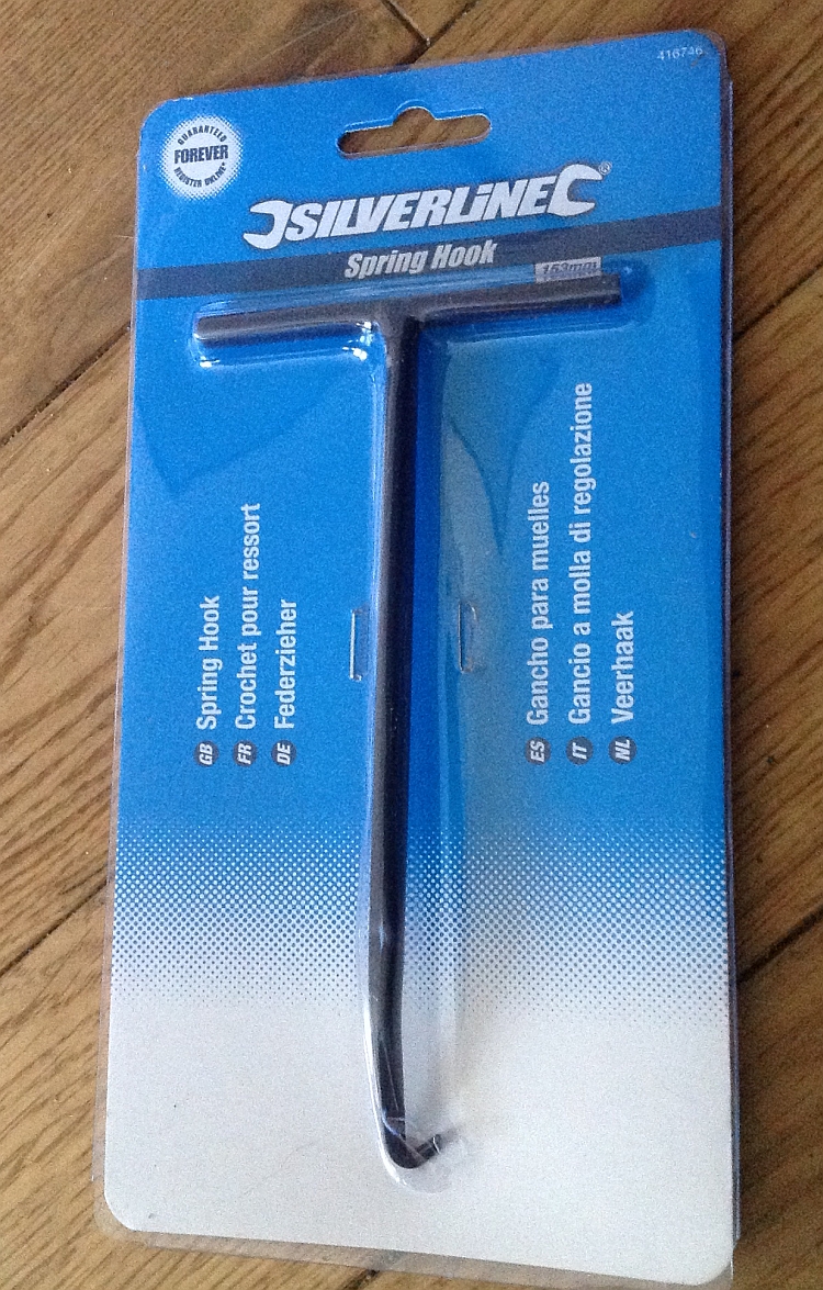The silverline spring puller in it's packet. A T handled bar with a hook for pulling springs