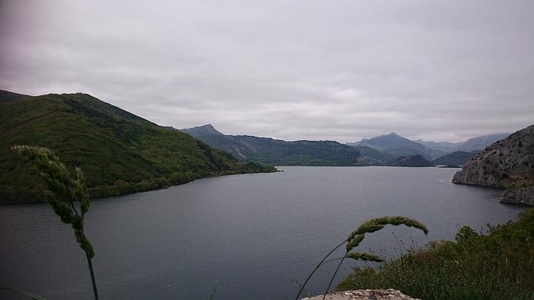 From a vantage point we see the large reservoir set between the green valley sides