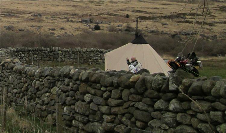 Withing the hardy grasses and hills we can see the top of Bernard's large tee-pee tent
