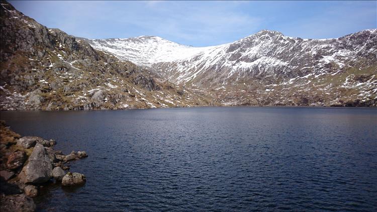 The reservoir against the rocky mountain top look perfectly matched