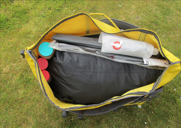 The big tent bag in another bag with cartons of food and the poles etc