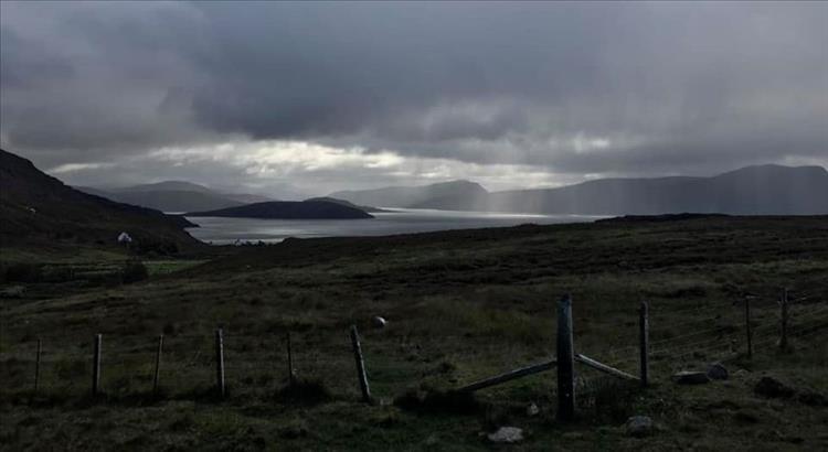 Dark heavy skies over the now quite sinister looking shore of Achiltibuie
