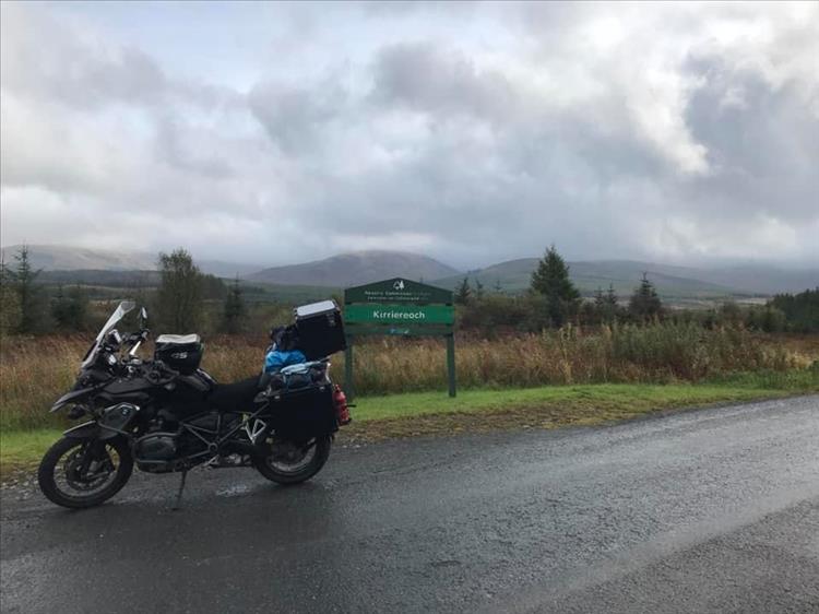 Andys BMW at the roadside of the wet, remote and wild moors near Kirriereoch