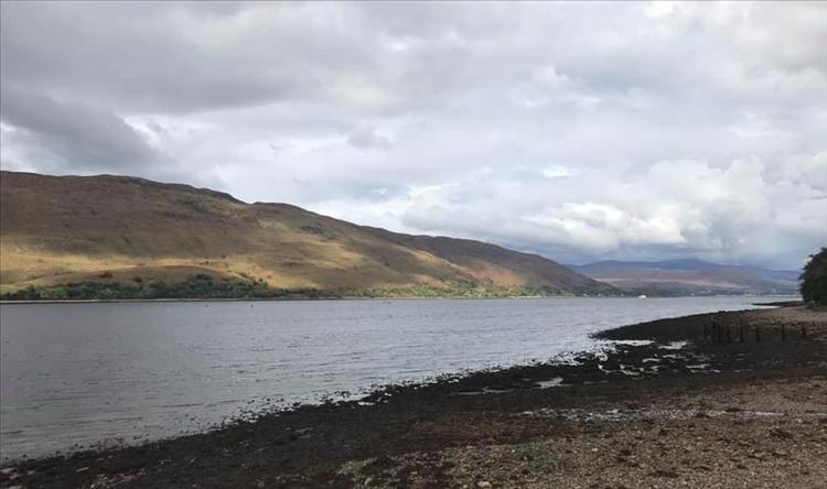 Loch Eil again this time from a pebble beach looking into grey skies over the hills
