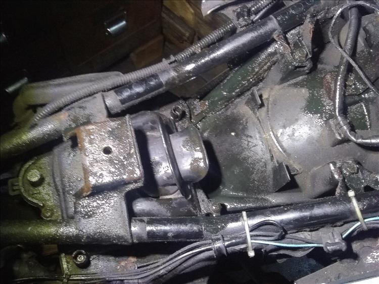 The frame under the seat is covered in spray grease to hopefully stop the rust