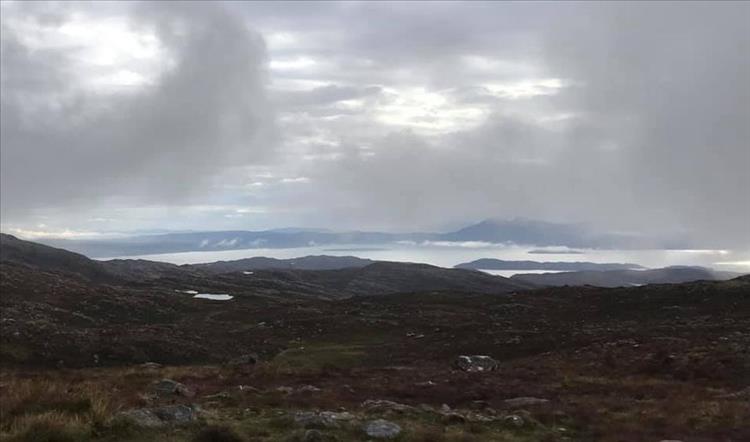 Again gray skies but islets, mountains, lochs and the sea all seen from the top of the pass