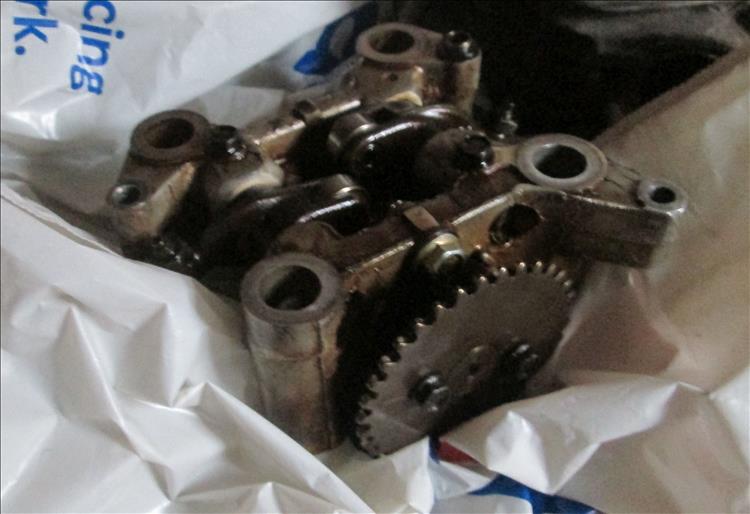 The camshaft, rockers and adjusters all in one unit