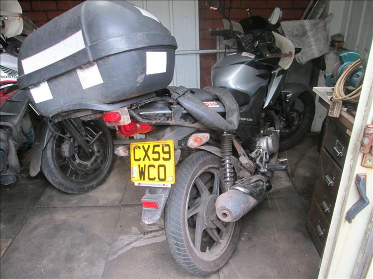The rusty crusty diry old ragged CBF125 motorcycle