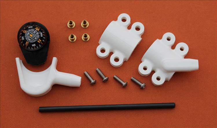 Various 3D printed parts, nuts and bolts and the compass ready to mount to the mirror stem