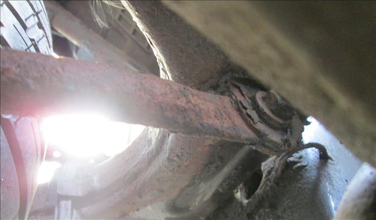 The underside has less rust but some flaky paint