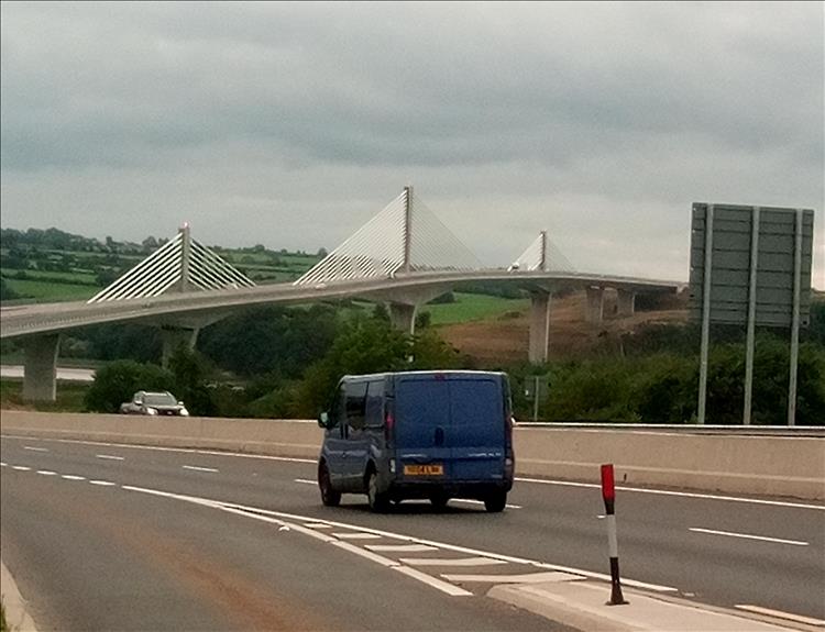A smart suspension bridge in the distance