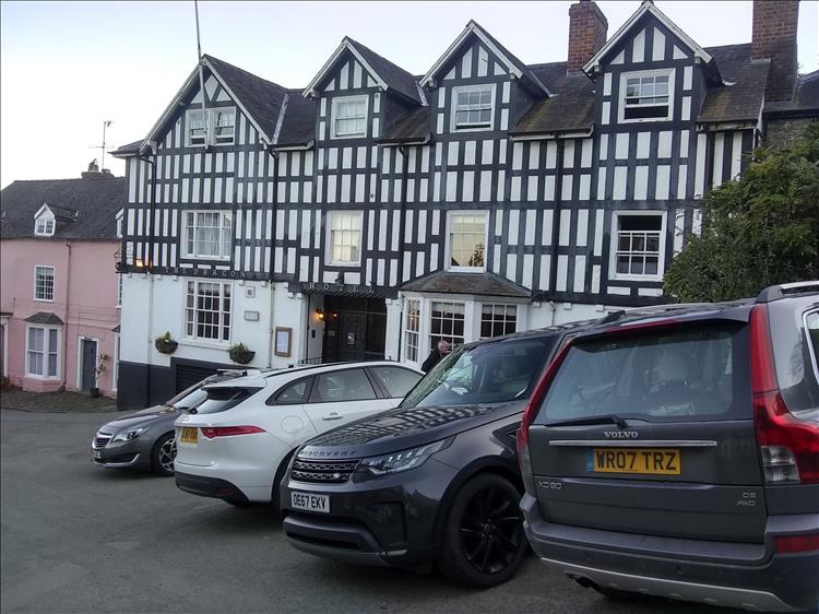Timber framed effect building that is the Dragon Hotel in Motgomery
