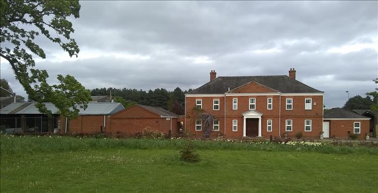 A vary large brick built house at North Runcton